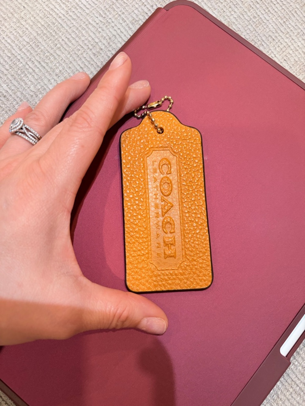 Coach Pebbled Leather Hangtag in Mustard Yellow with Gold Chain